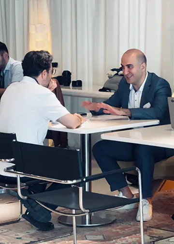 Rem Darbinyan in a one-to-one mentoring conversation with a founder